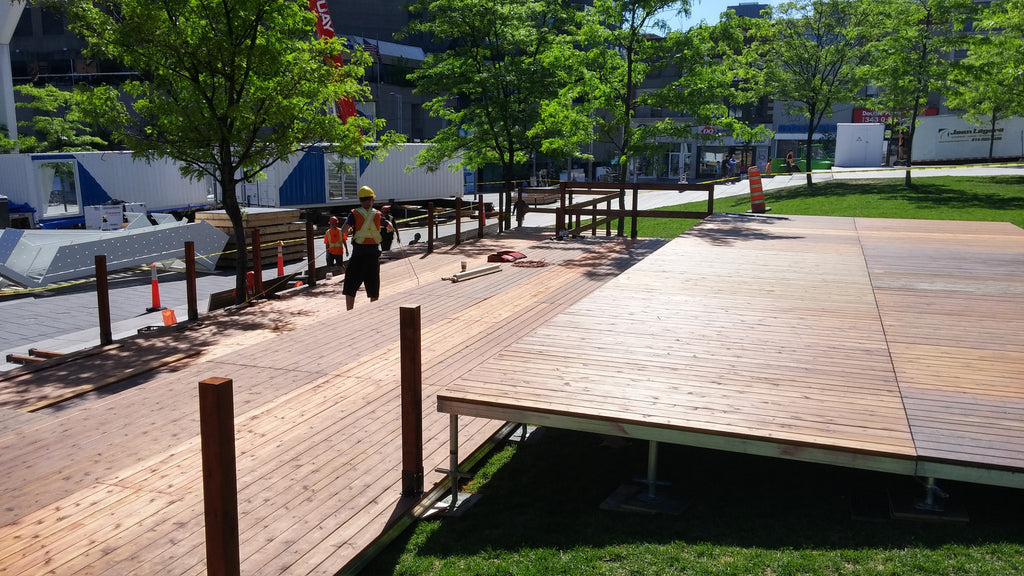 Setting up 3000 sq ft split level deck for Les Francofolies de Montréal, Bistro SAQ